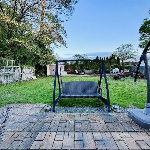 368 W St, Randolph, MA 02368 - view of patio with a storage shed and an outdoor structure
