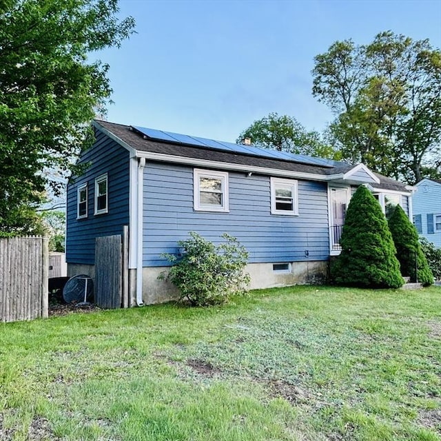 368 W St, Randolph, MA 02368 - view of side of property featuring roof mounted solar panels