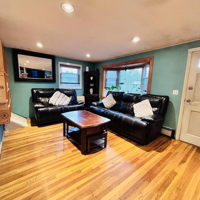 368 W St, Randolph, MA 02368 - living area with wood finished floors, recessed lighting, and baseboard heating
