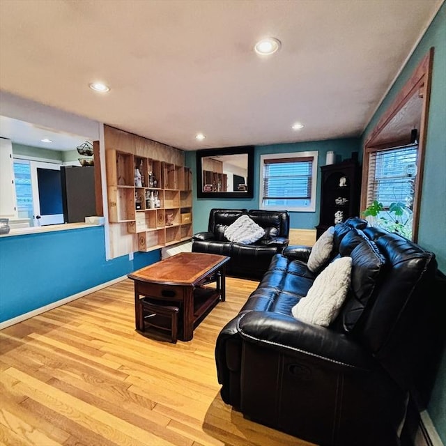 368 W St, Randolph, MA 02368 - living room with light wood-type flooring and recessed lighting
