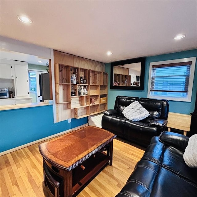 368 W St, Randolph, MA 02368 - living room featuring wood finished floors and recessed lighting