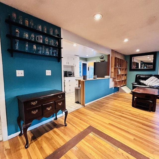 368 W St, Randolph, MA 02368 - living room with light wood-style floors and recessed lighting