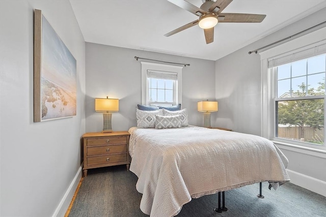 bedroom with baseboards and ceiling fan