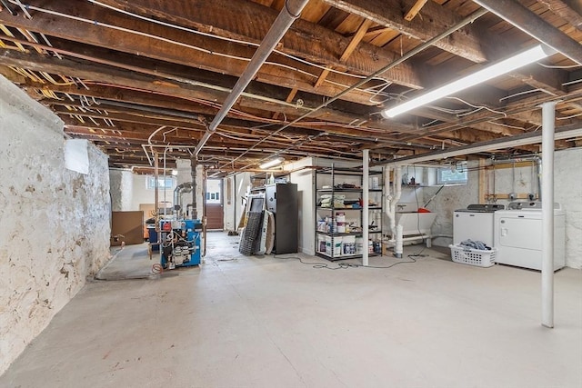 basement with separate washer and dryer