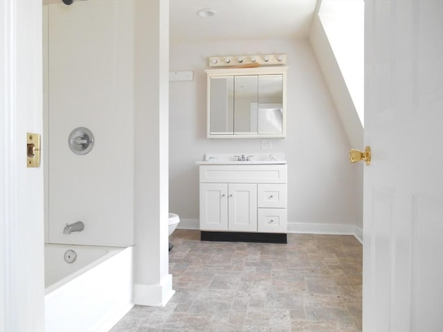 23 Trafalgar Sq Unit 23, Barre, MA 01005 - full bathroom with vanity, stone finish floors, toilet, baseboards, and  shower combination
