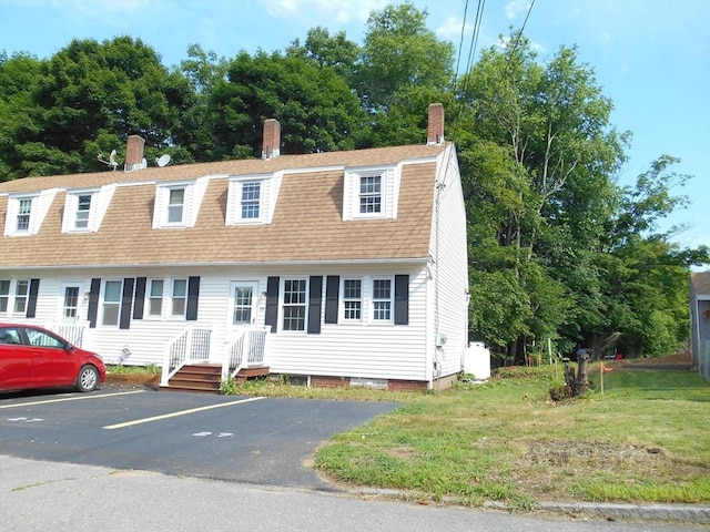 23 Trafalgar Sq Unit 23, Barre, MA 01005 - dutch colonial featuring a gambrel roof, a shingled roof, a chimney, and uncovered parking