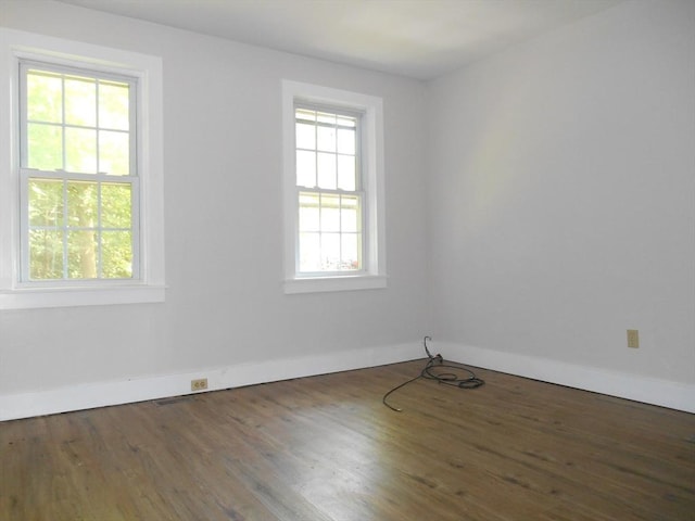 23 Trafalgar Sq Unit 23, Barre, MA 01005 - spare room featuring baseboards and wood finished floors