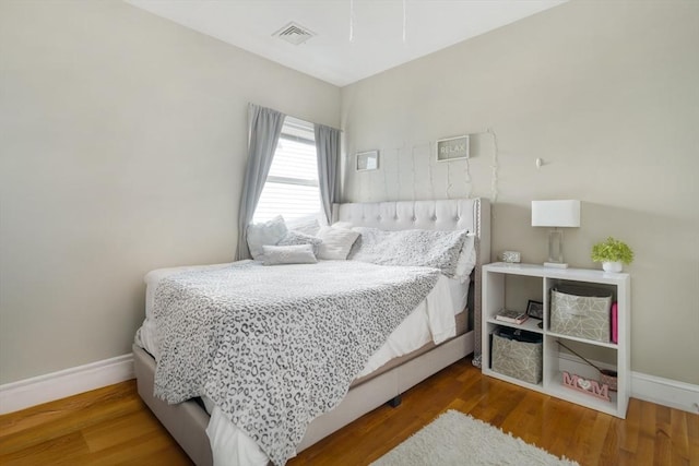 106 Walnut St Unit 4, Somerville, MA 02145 - bedroom featuring baseboards and wood finished floors