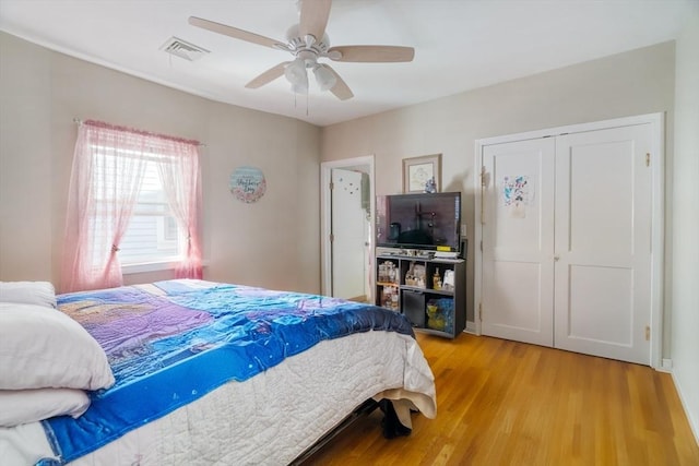 106 Walnut St Unit 4, Somerville, MA 02145 - bedroom featuring light wood-style floors, a ceiling fan, and a closet