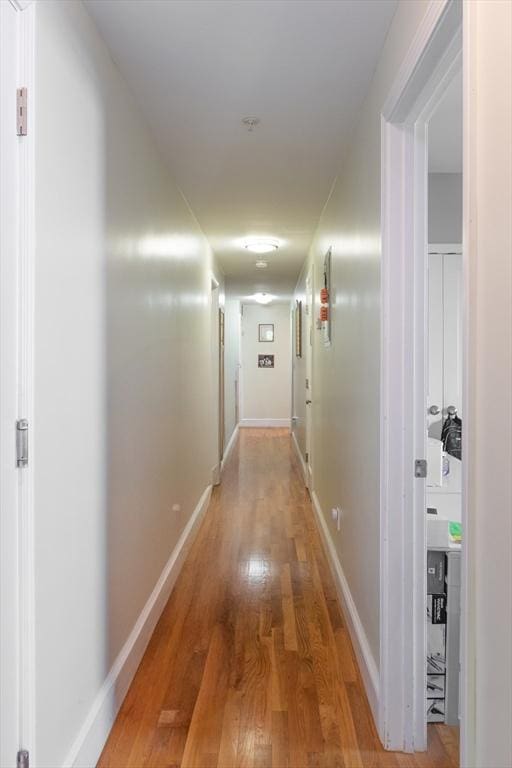 106 Walnut St Unit 4, Somerville, MA 02145 - corridor featuring light wood-style floors and baseboards