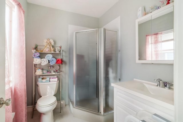 106 Walnut St Unit 4, Somerville, MA 02145 - bathroom with a shower stall, toilet, vanity, and tile patterned floors