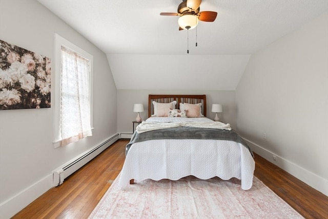 4 Rendall Pl, Melrose, MA 02176 - bedroom with a baseboard heating unit, wood-type flooring, lofted ceiling, baseboards, and a ceiling fan