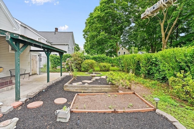 4 Rendall Pl, Melrose, MA 02176 - view of yard with a garden and a patio