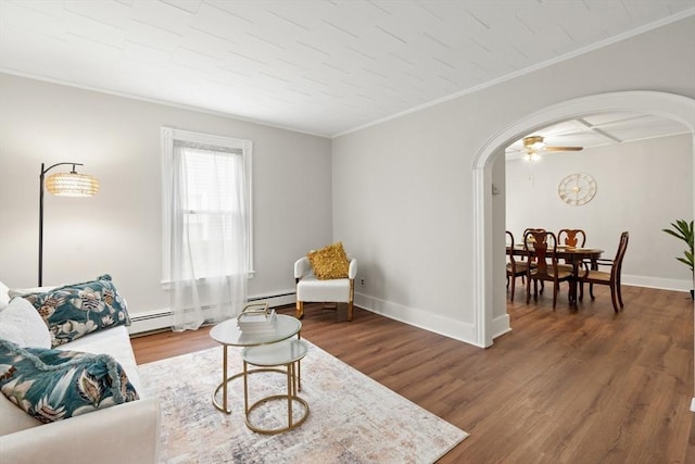 4 Rendall Pl, Melrose, MA 02176 - living area with arched walkways, crown molding, wood finished floors, baseboards, and ceiling fan