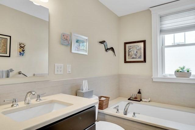 15 Thatcher St Unit F2-2, Brookline, MA 02446 - bathroom with vanity and a bath