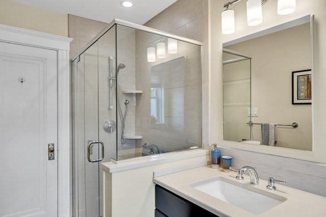 15 Thatcher St Unit F2-2, Brookline, MA 02446 - bathroom with vanity and a stall shower