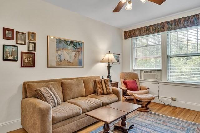 15 Thatcher St Unit F2-2, Brookline, MA 02446 - living room featuring plenty of natural light, cooling unit, and wood finished floors