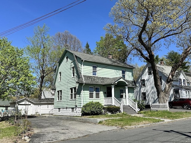 14 Aster, Springfield, MA 01109 - view of front of home featuring a gambrel roof, a shingled roof, a chimney, and an outdoor structure