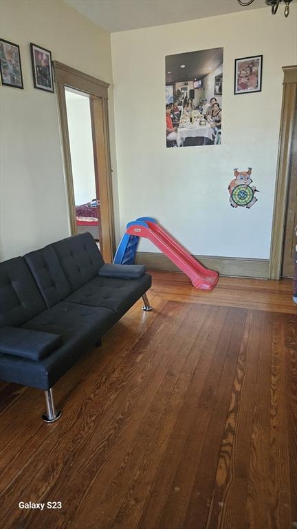 living room with hardwood / wood-style floors