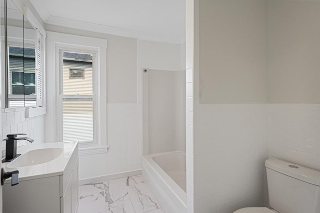 1 Melville St, Worcester, MA 01605 - bathroom with tile walls, marble finish floors, vanity, toilet, and a wainscoted wall