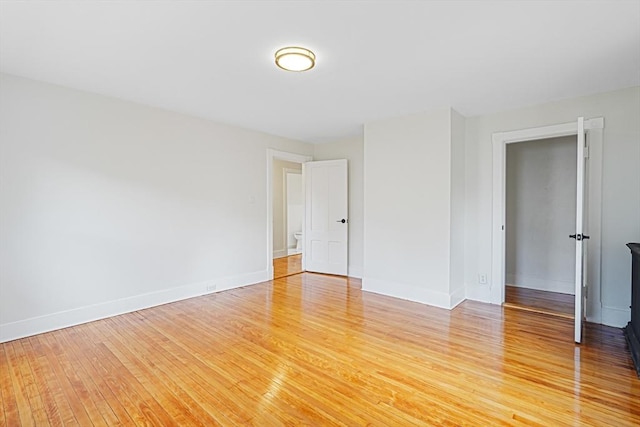 1 Melville St, Worcester, MA 01605 - empty room with light wood-type flooring and baseboards