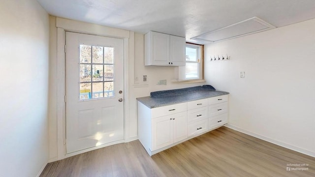 doorway with light hardwood / wood-style floors