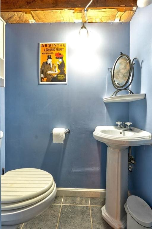 249 E Squantum St Unit 2, Quincy, MA 02171 - bathroom with toilet and tile patterned floors