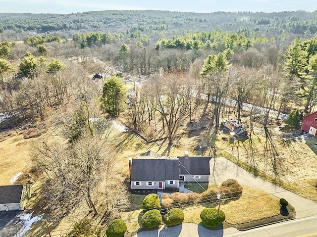 bird's eye view featuring a view of trees