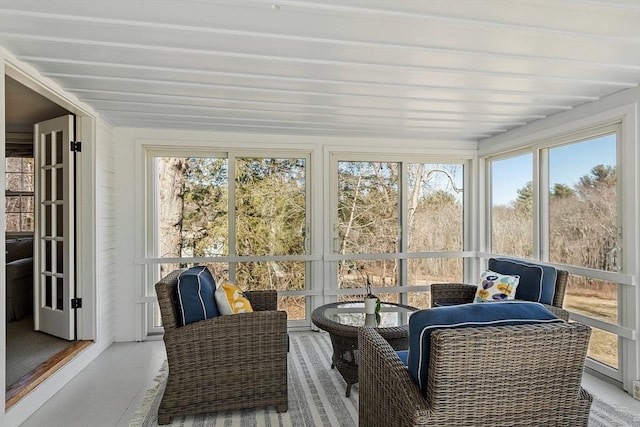 sunroom / solarium with beam ceiling