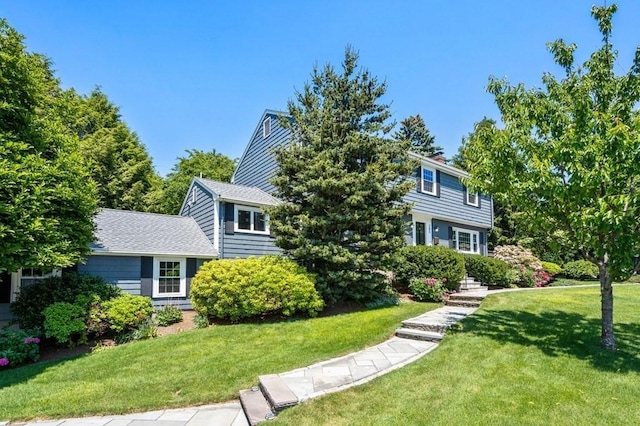 view of front of property with a front lawn