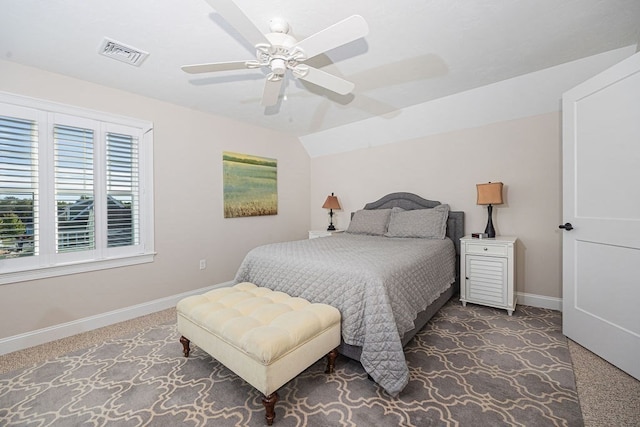 bedroom with lofted ceiling, carpet, and ceiling fan