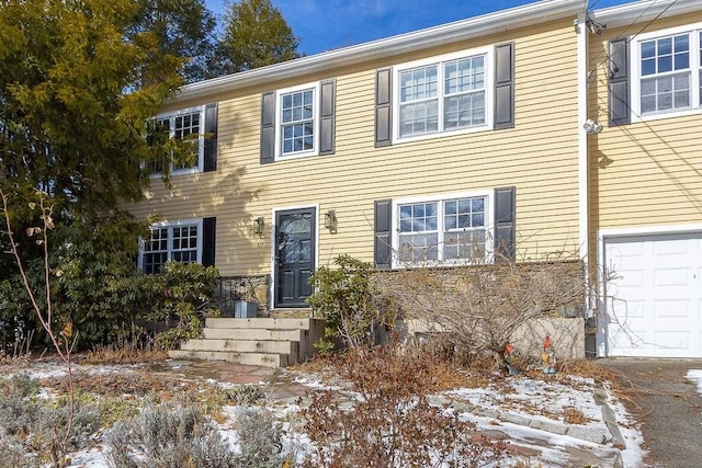 view of front of property with a garage