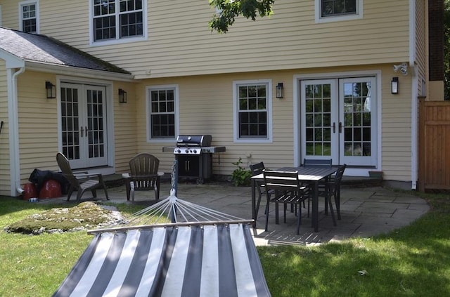 view of patio / terrace featuring grilling area and french doors