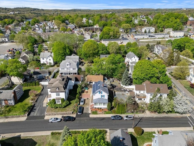 aerial view of property's location featuring nearby suburban area