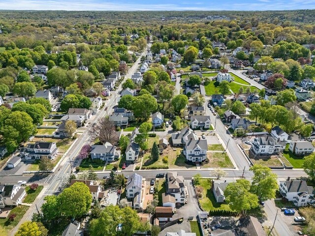 aerial view of property's location with nearby suburban area