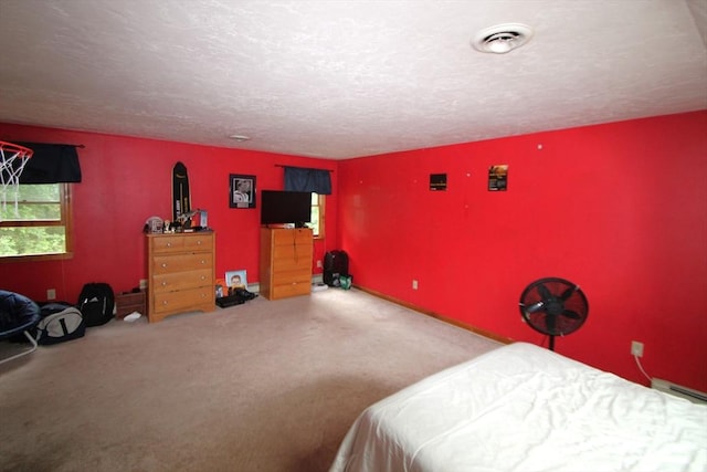 31 Trudeau Ln, East Bridgewater, MA 02333 - bedroom with carpet flooring, a textured ceiling, and a baseboard radiator