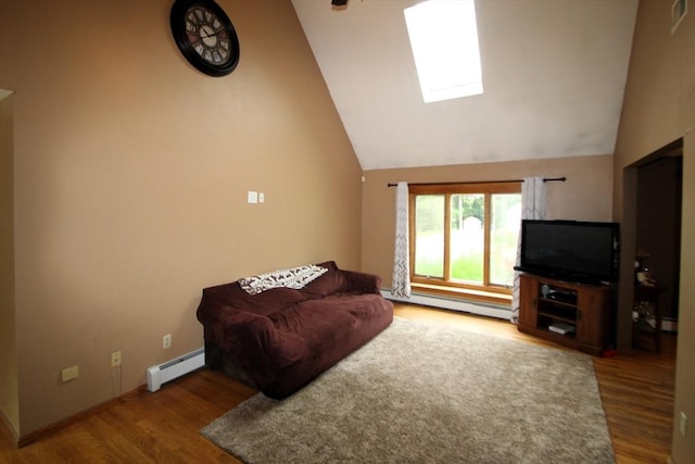 31 Trudeau Ln, East Bridgewater, MA 02333 - living area with a baseboard radiator, wood finished floors, vaulted ceiling, and a skylight