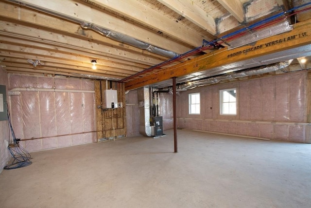 basement featuring heating unit