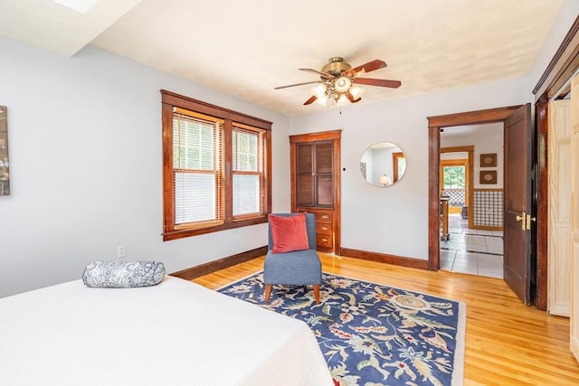 204 Massasoit Rd, Worcester, MA 01604 - bedroom featuring light wood-style floors, baseboards, and a ceiling fan