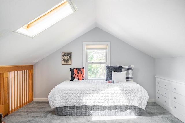 204 Massasoit Rd, Worcester, MA 01604 - carpeted bedroom with vaulted ceiling, a skylight, and baseboards