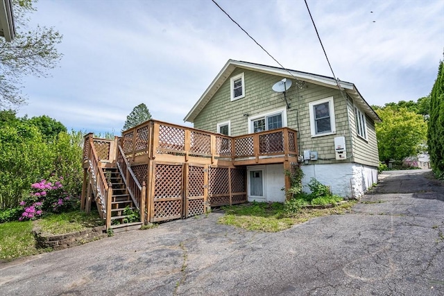 204 Massasoit Rd, Worcester, MA 01604 - view of front of property featuring a deck, stairs, and driveway
