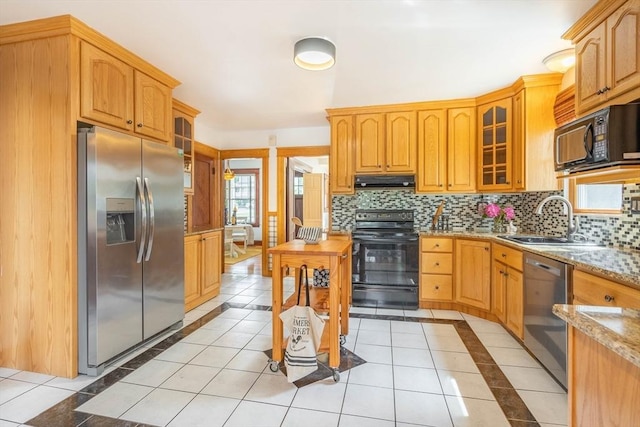 204 Massasoit Rd, Worcester, MA 01604 - kitchen with black appliances, inlaid floor details, a sink, under cabinet range hood, and backsplash
