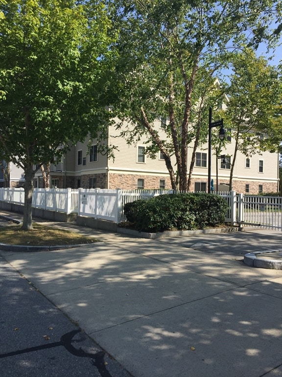 view of street with curbs