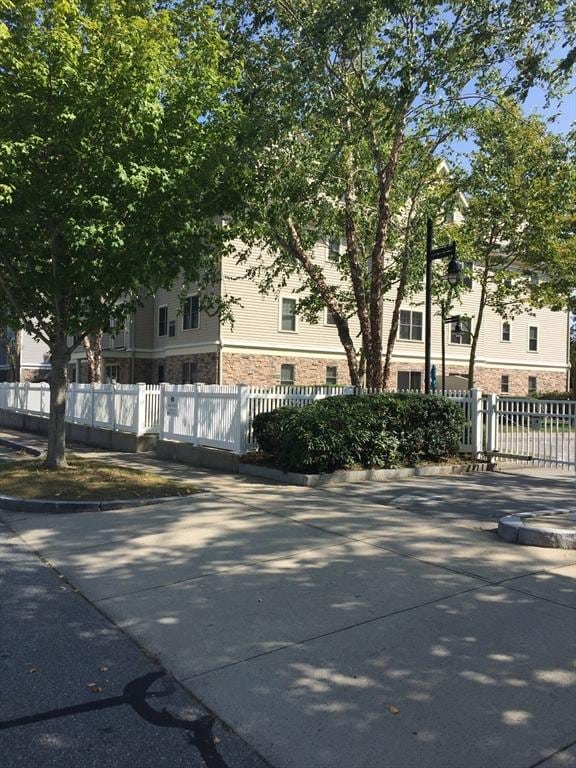 view of street featuring curbs