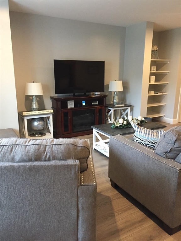 living room with hardwood / wood-style floors