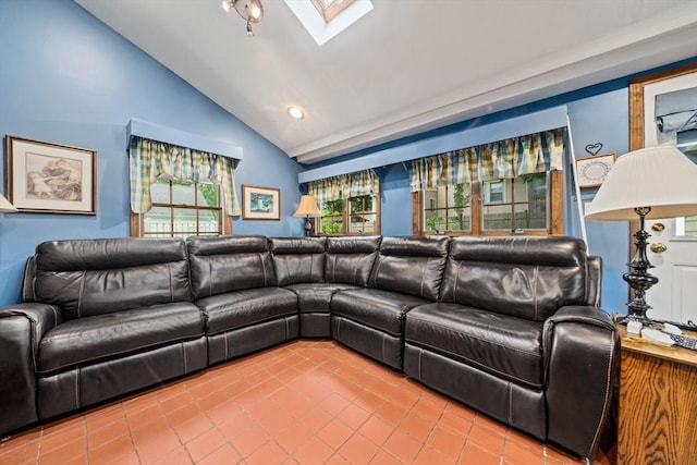205 River St, Braintree, MA 02184 - living area featuring tile patterned flooring, lofted ceiling, a skylight, and recessed lighting