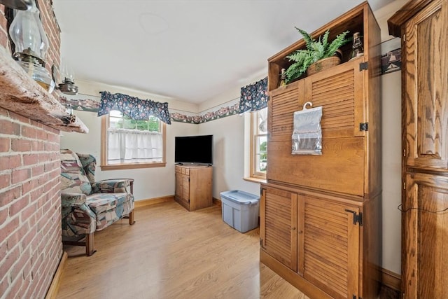 205 River St, Braintree, MA 02184 - living room with healthy amount of natural light, light wood-style flooring, and baseboards