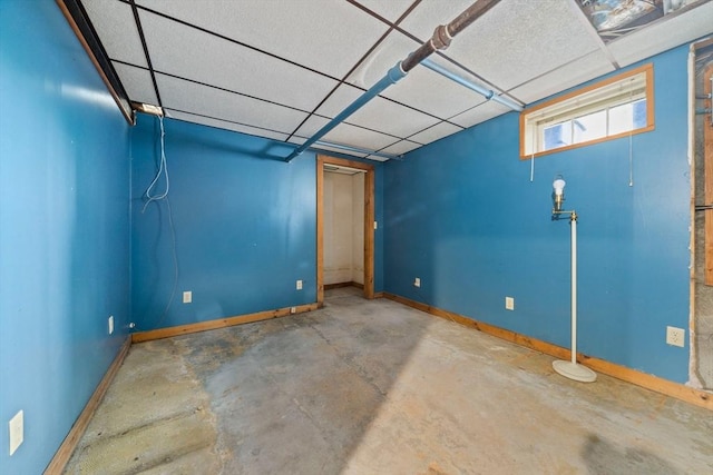 205 River St, Braintree, MA 02184 - below grade area featuring baseboards and a drop ceiling