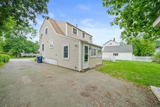 205 River St, Braintree, MA 02184 - back of property featuring roof with shingles