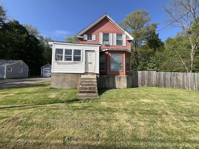 104 Temple St, Gardner, MA 01440 - view of front of house featuring a detached garage and driveway